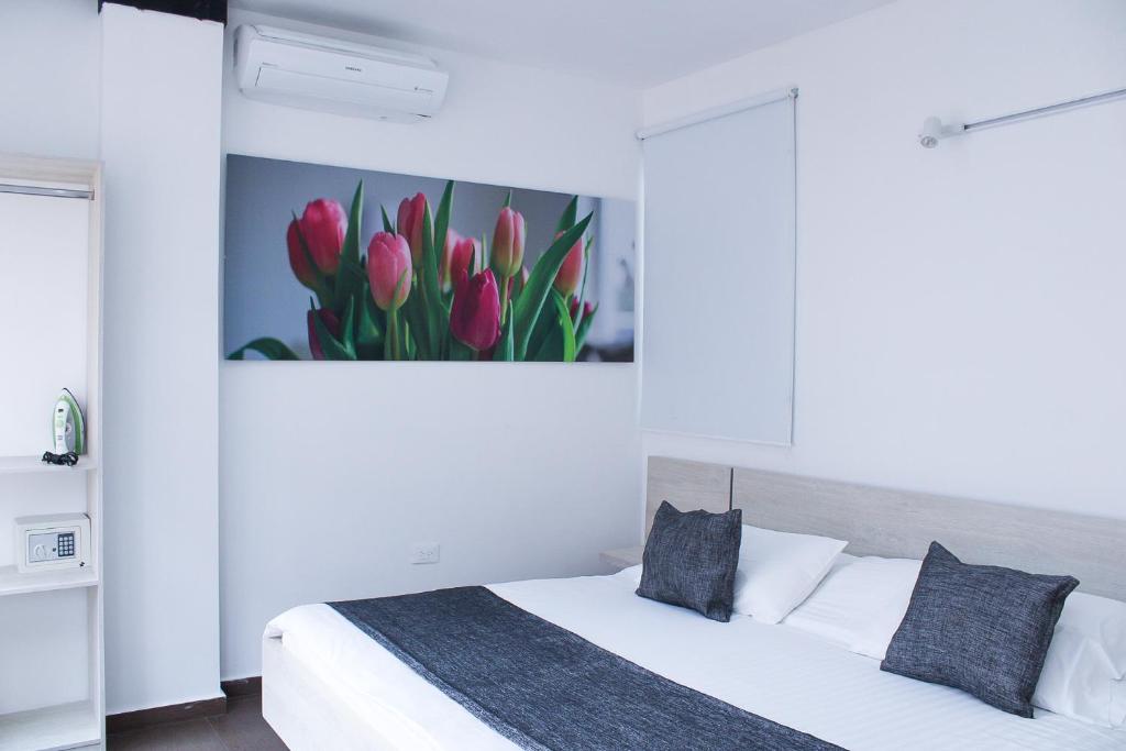 Cama o camas de una habitación en BGA Hotel