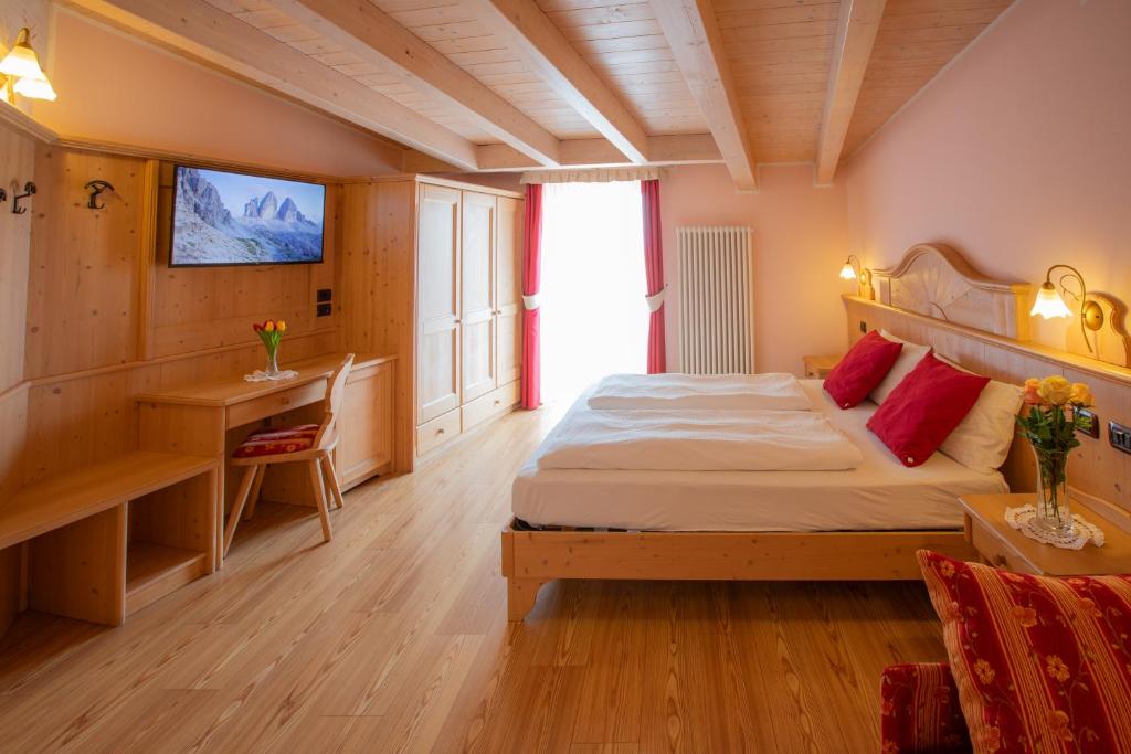 Postel nebo postele na pokoji v ubytování B&B Casa Agostini