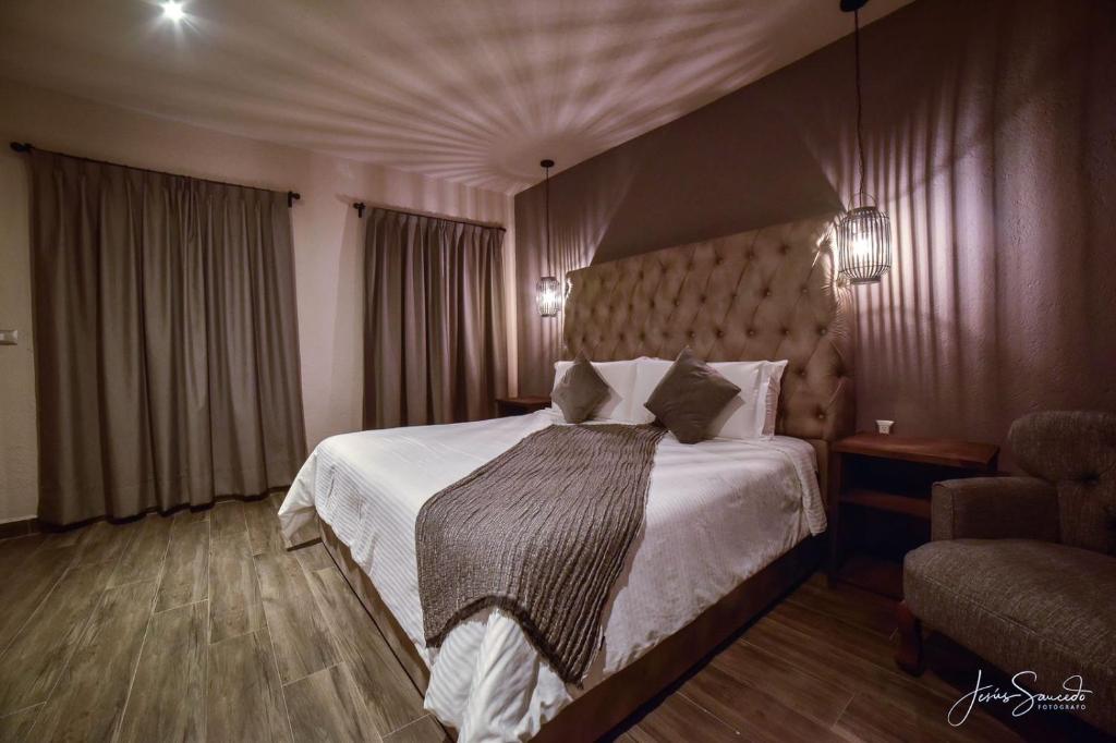 Postel nebo postele na pokoji v ubytování Suites Campestres Montebello
