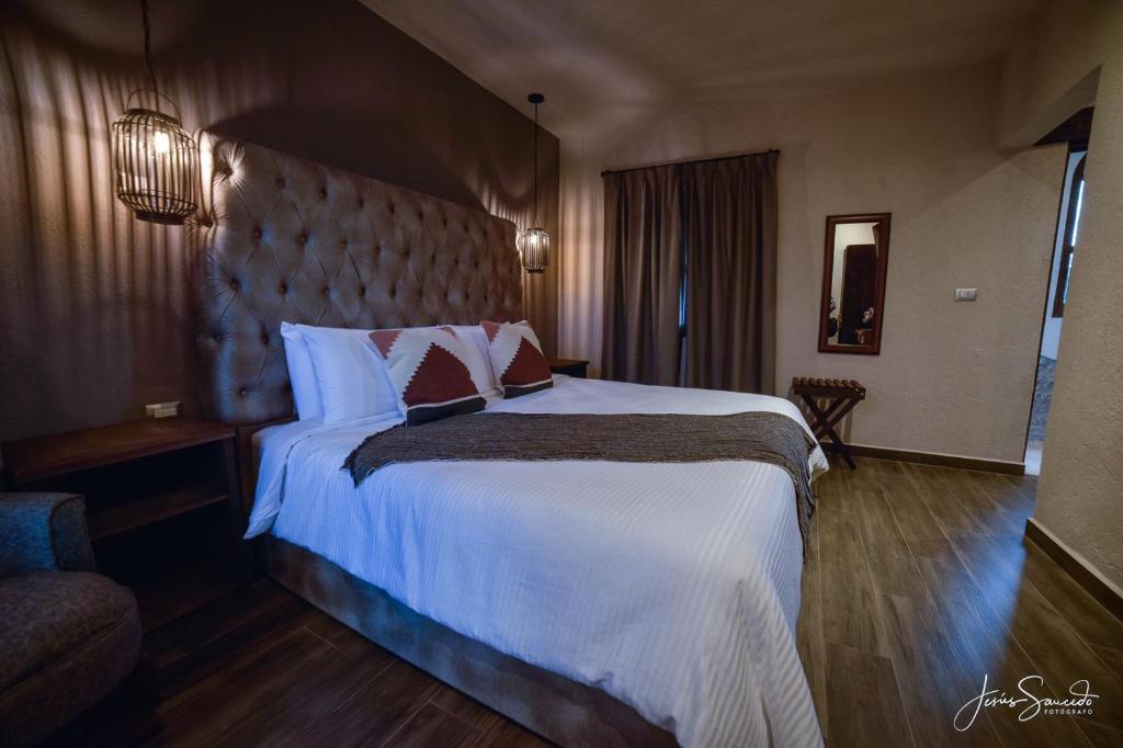 Postel nebo postele na pokoji v ubytování Suites Campestres Montebello