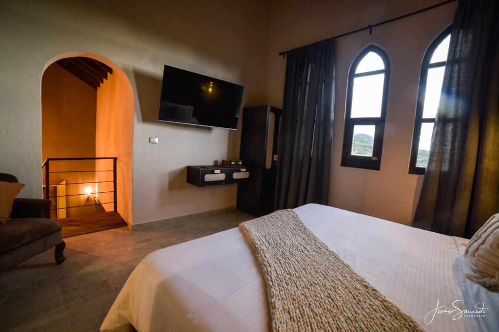 Postel nebo postele na pokoji v ubytování Suites Campestres Montebello