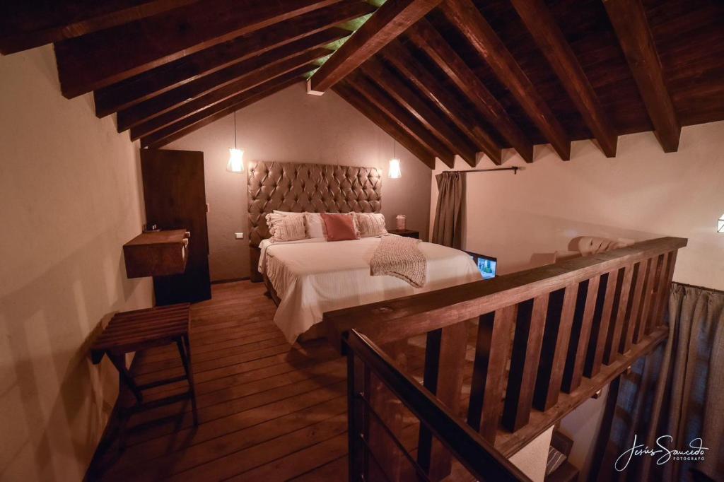Postel nebo postele na pokoji v ubytování Suites Campestres Montebello