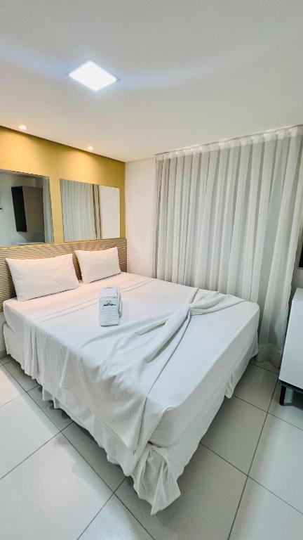 Cama ou camas em um quarto em Hotel Pousada Kairos Manaira