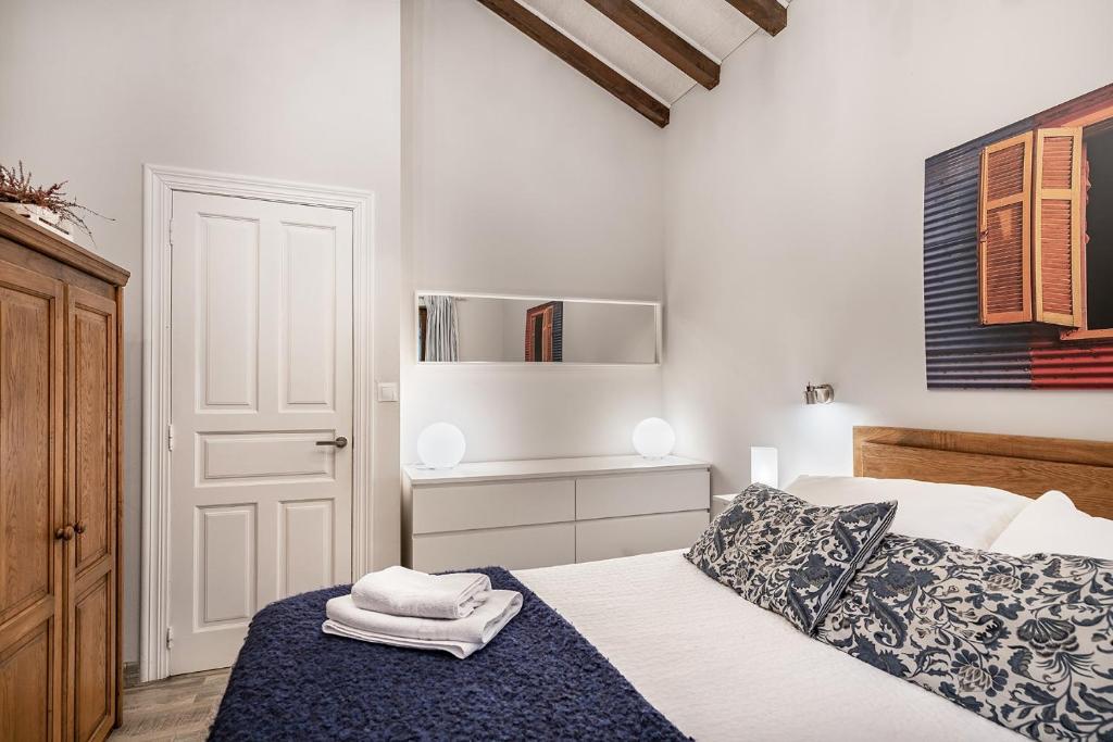A bed or beds in a room at Excepcional Apartamento El Olivo