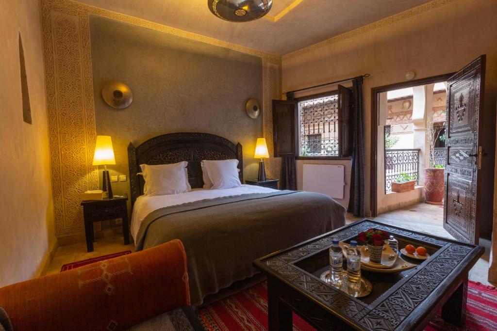 Postel nebo postele na pokoji v ubytování Les Sources Berbères Riad & Spa
