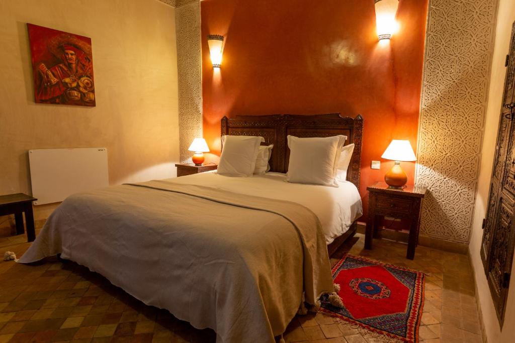 Postel nebo postele na pokoji v ubytování Les Sources Berbères Riad & Spa