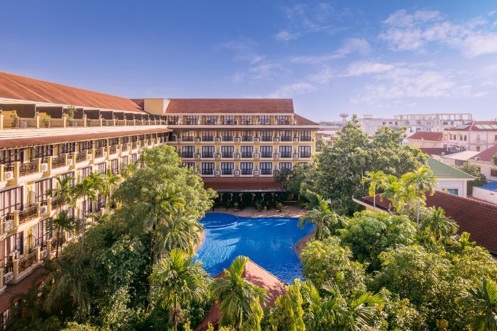 an overhead view of a building with a swimming pool at Angkor Paradise Hotel in Siem Reap