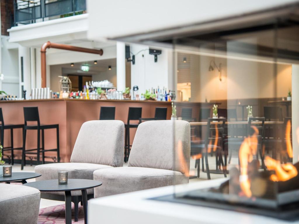 Ein Sitzbereich in der Unterkunft Hotel Alte Post Flensburg