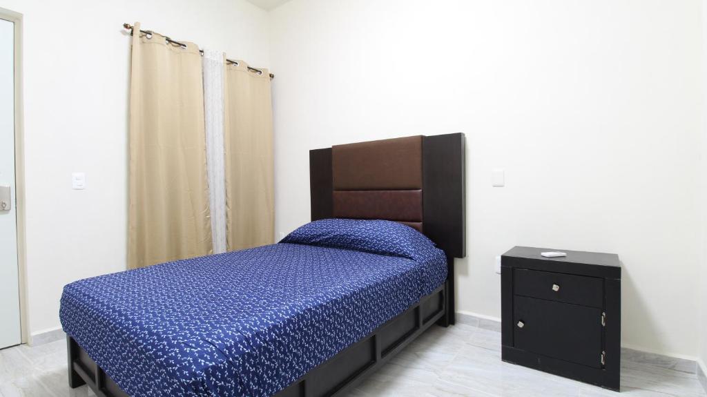 Postel nebo postele na pokoji v ubytování Hotel Vias Maya Bacalar