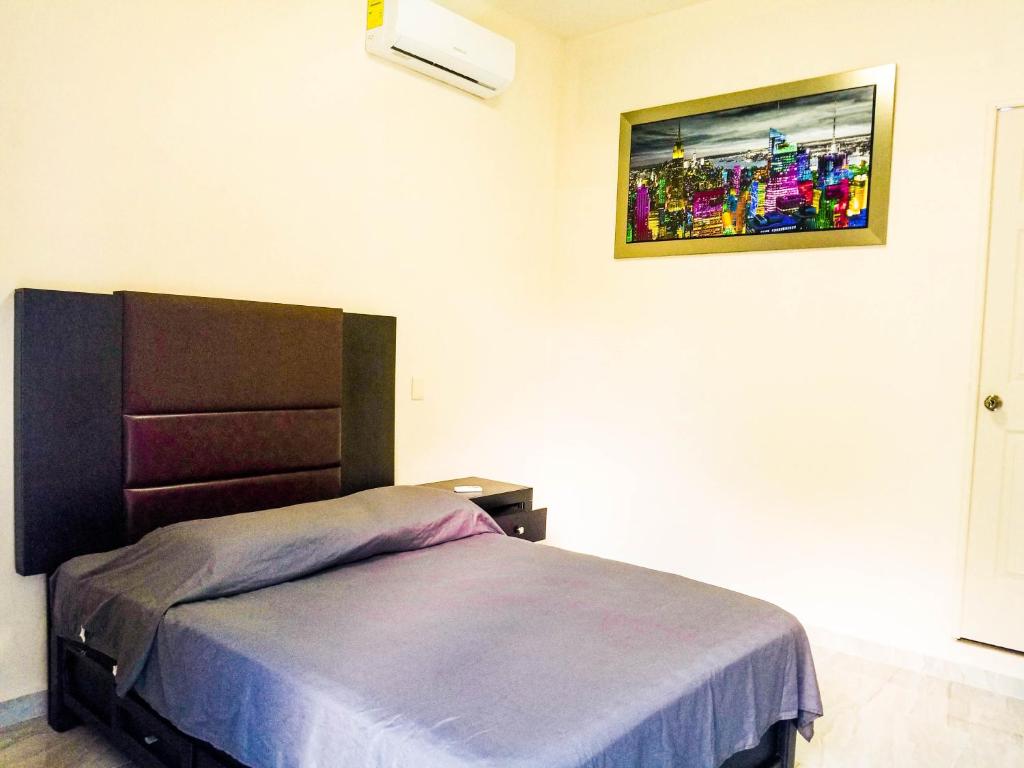 Postel nebo postele na pokoji v ubytování Hotel Vias Maya Bacalar