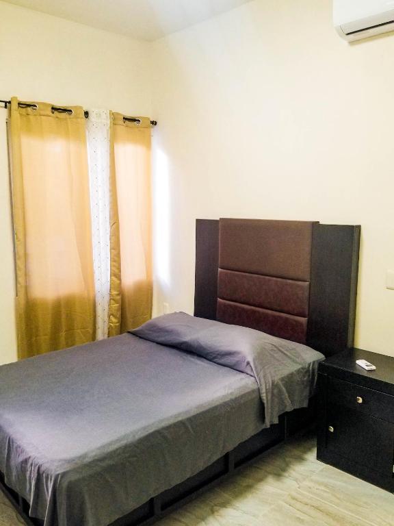 Postel nebo postele na pokoji v ubytování Hotel Vias Maya Bacalar