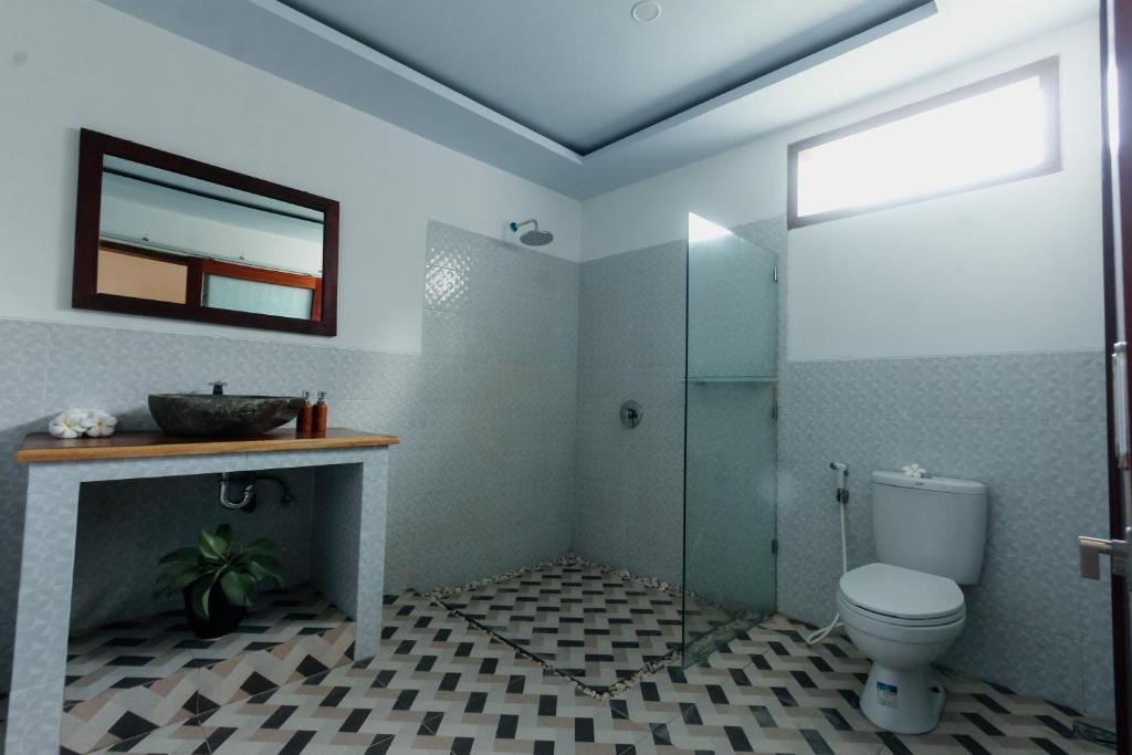 Koupelna v ubytování Sayang Bungalows