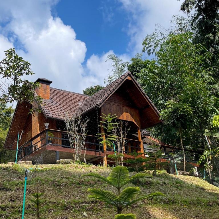 a house on top of a hill with at Chez DARA in Mon Jam