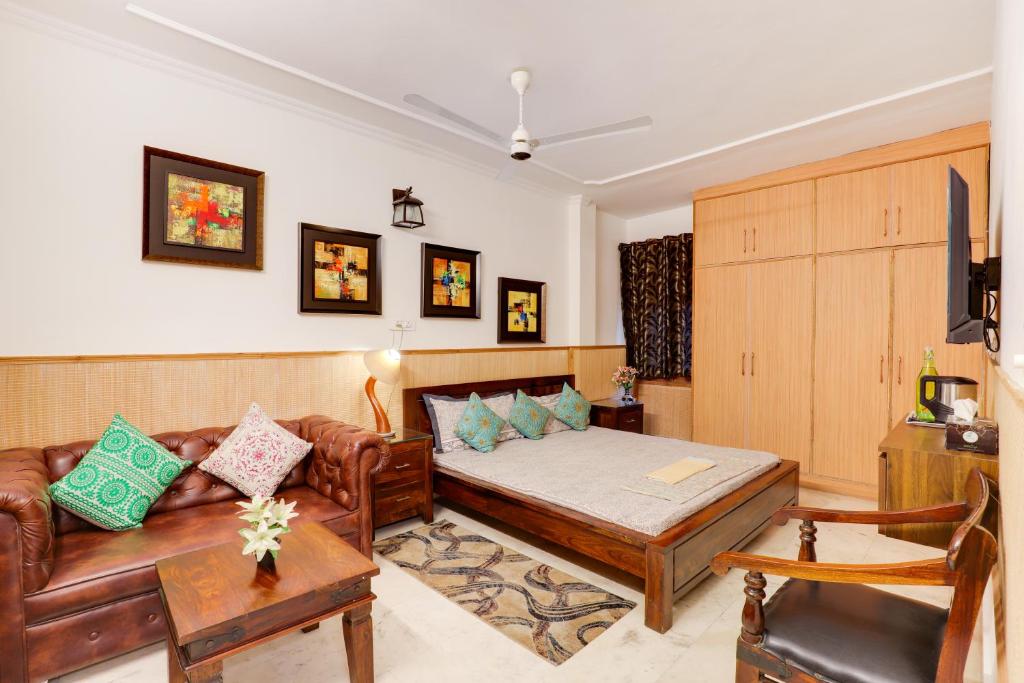 Posezení v ubytování House of Comfort Noida