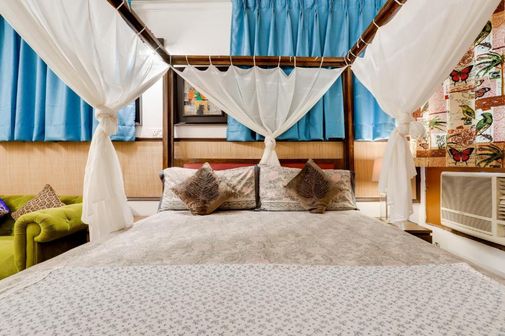 Postel nebo postele na pokoji v ubytování House of Comfort Noida