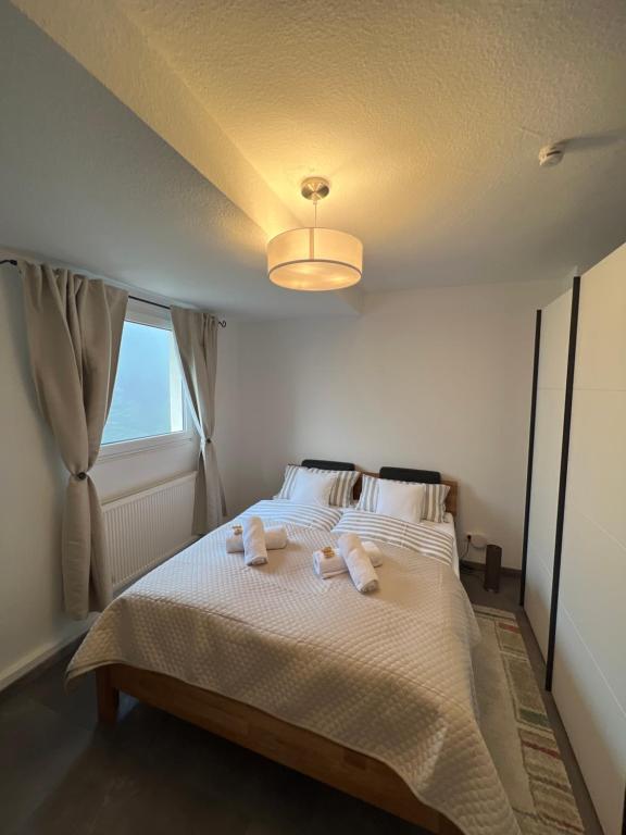 Ein Bett oder Betten in einem Zimmer der Unterkunft Ferienhaus am Bach Koblenz