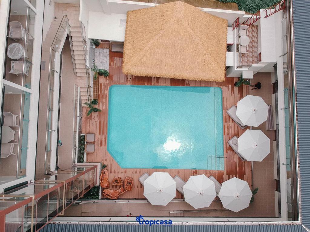 Bazén v ubytování Tropicasa Hotel nebo v jeho okolí