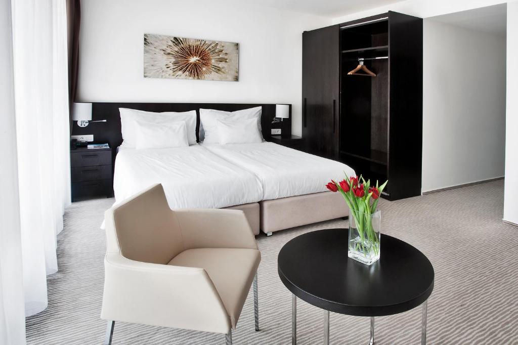 Postel nebo postele na pokoji v ubytování Wellness Hotel Vista