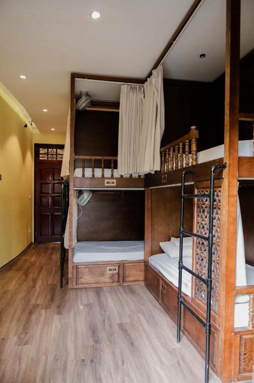 Postel nebo postele na pokoji v ubytování Tabalo Hostel Hanoi