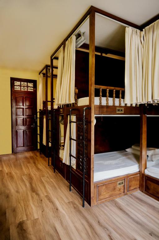 Postel nebo postele na pokoji v ubytování Tabalo Hostel Hanoi