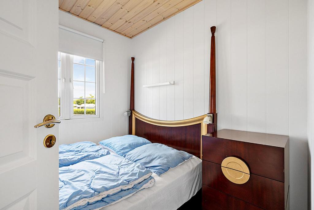 Letto o letti in una camera di First Camp Hasmark Camping Resort & Cottages