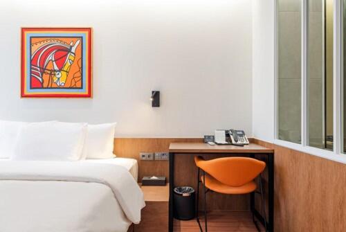 Postel nebo postele na pokoji v ubytování Hotel Cielo
