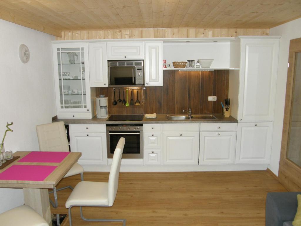 Kuchyň nebo kuchyňský kout v ubytování Apartment Altaussee