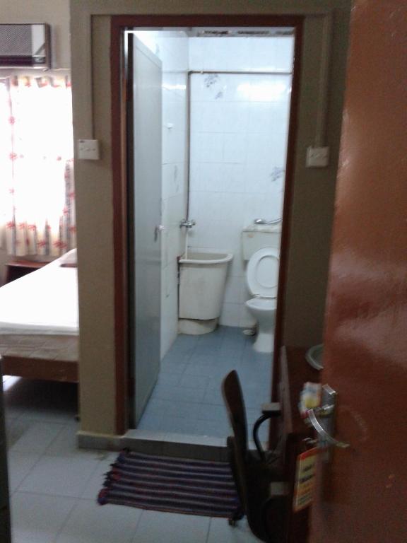 Koupelna v ubytování HotelMalaya