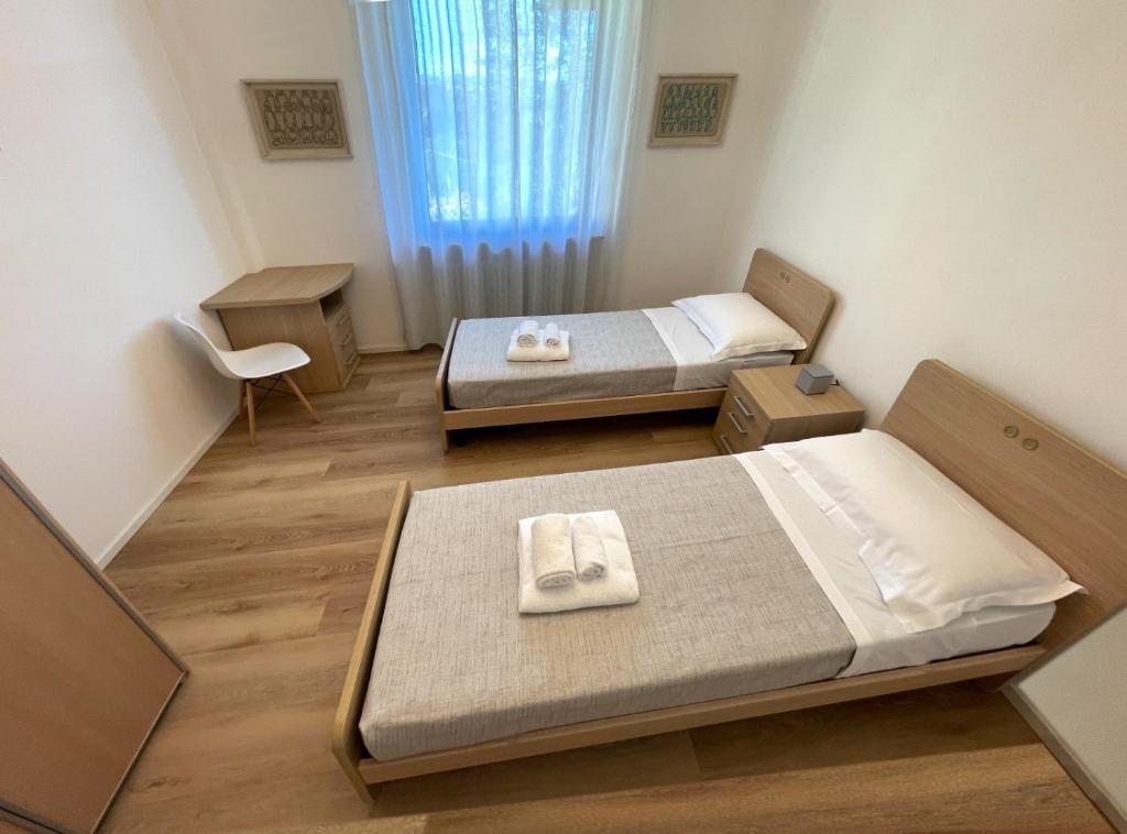 Postel nebo postele na pokoji v ubytování Cascina Parafada
