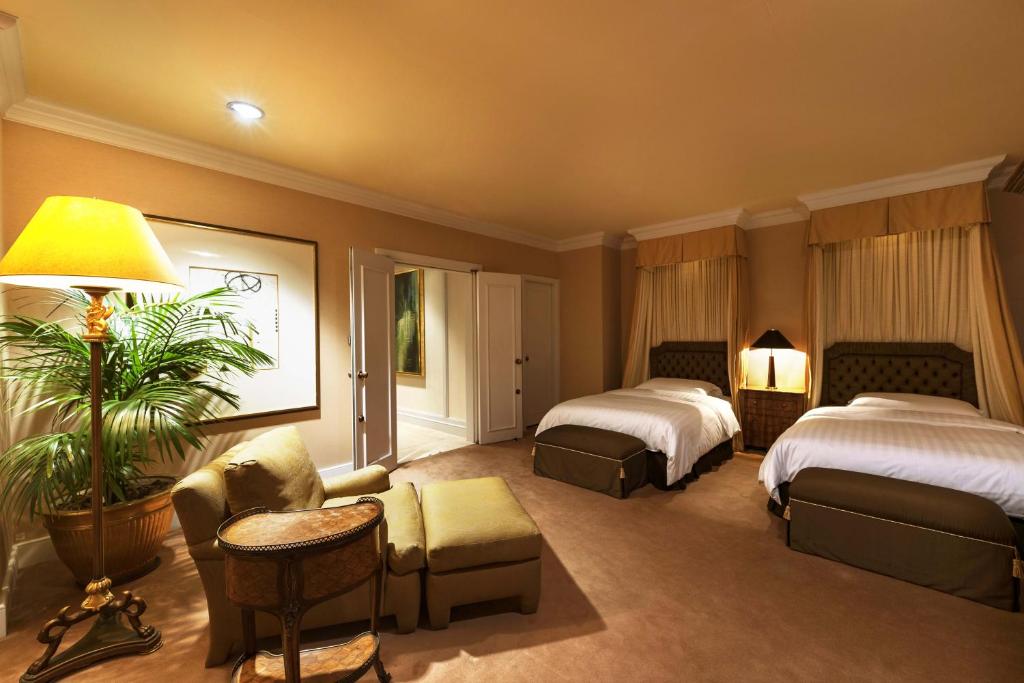 Postel nebo postele na pokoji v ubytování Hotel Hankyu International