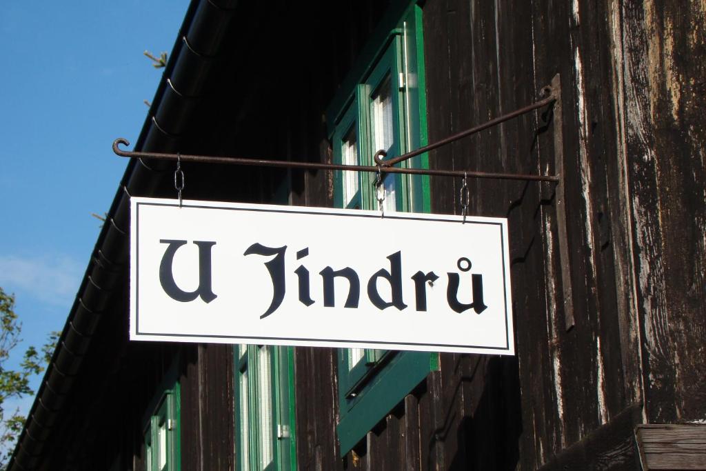 a sign hanging on the side of a building at U Jindrů in Abertamy