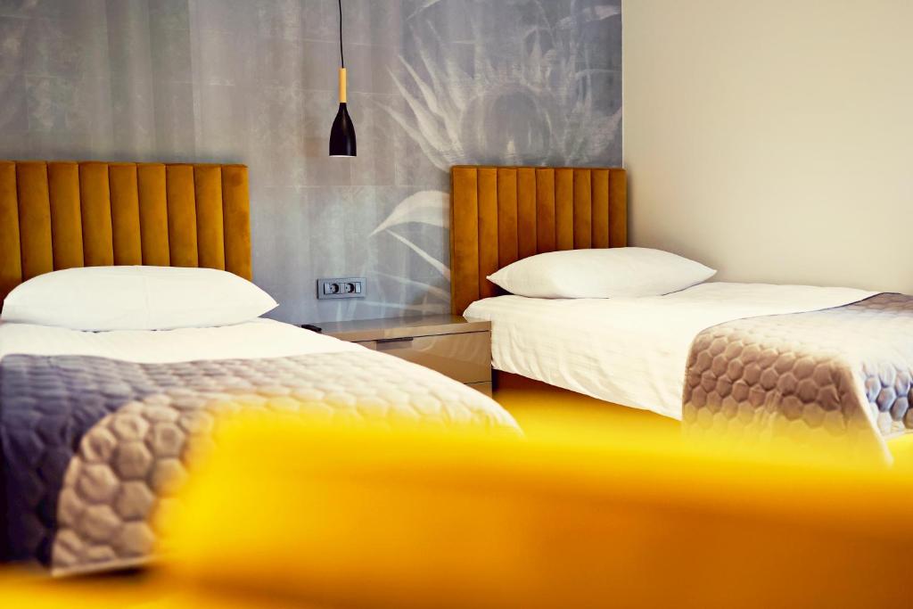 Postel nebo postele na pokoji v ubytování Motel Prajo’s