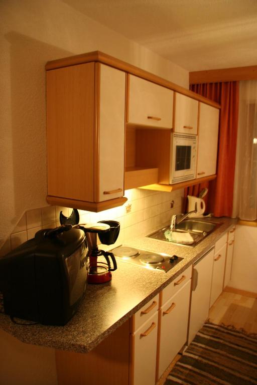 Kuchyň nebo kuchyňský kout v ubytování Haus Alpina
