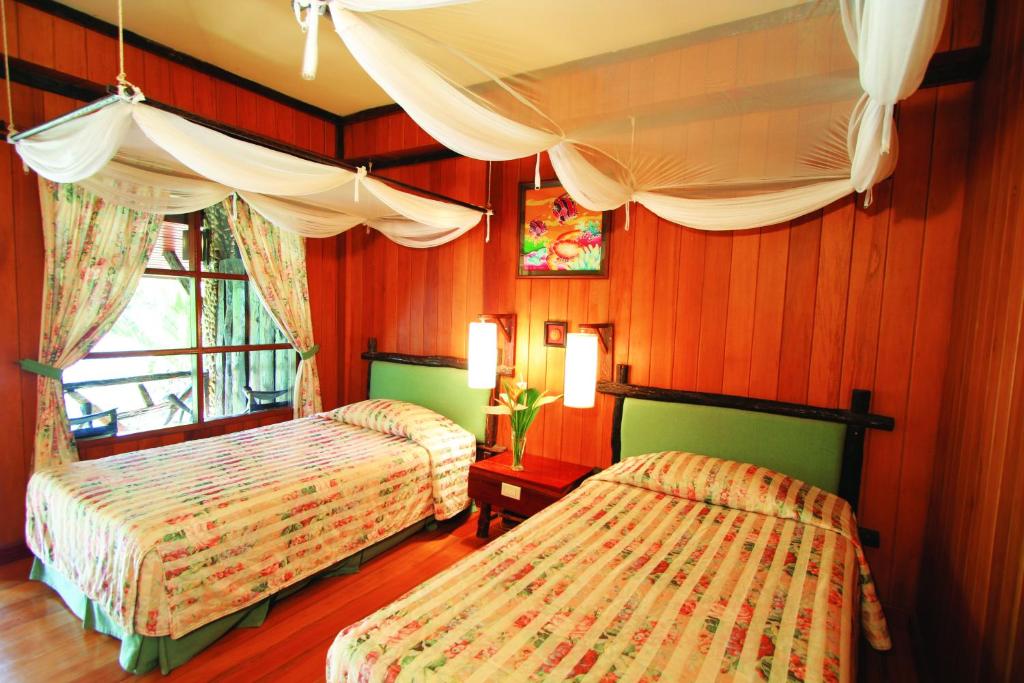 Postel nebo postele na pokoji v ubytování Banpu Koh Chang Resort