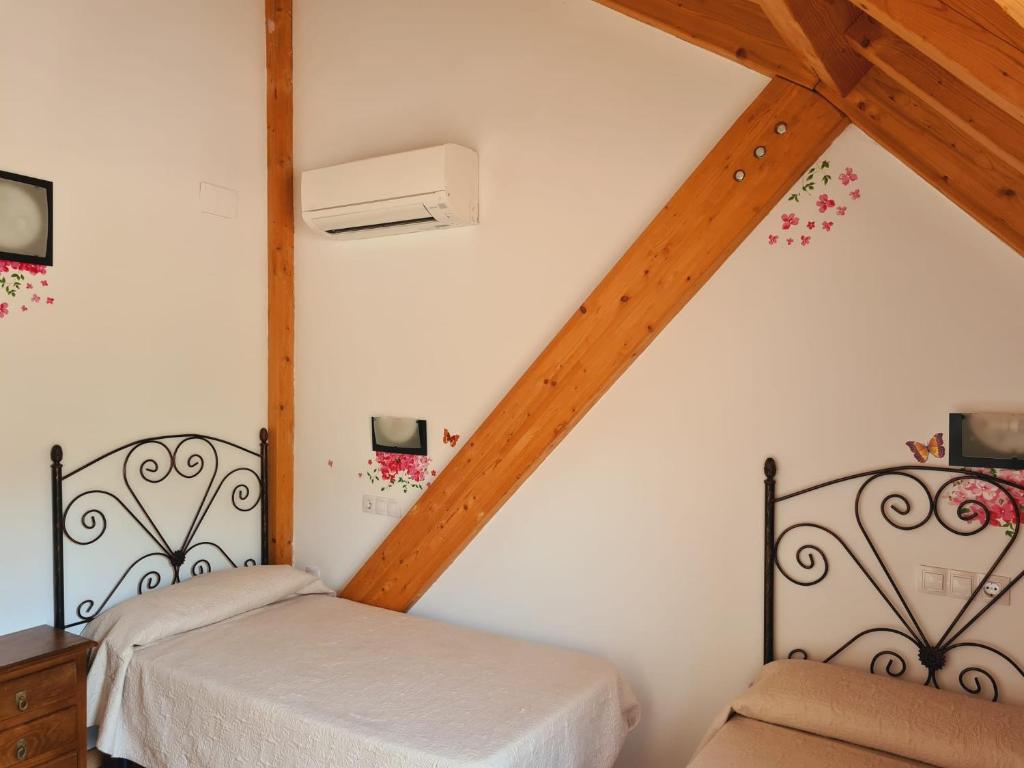 Una cama o camas en una habitación de Sierra de Cazorla