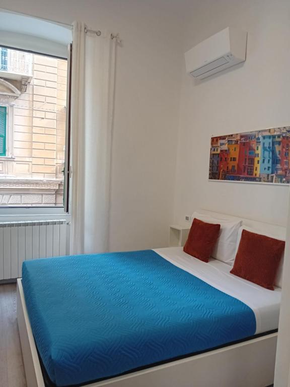 Postel nebo postele na pokoji v ubytování Titi Rooms