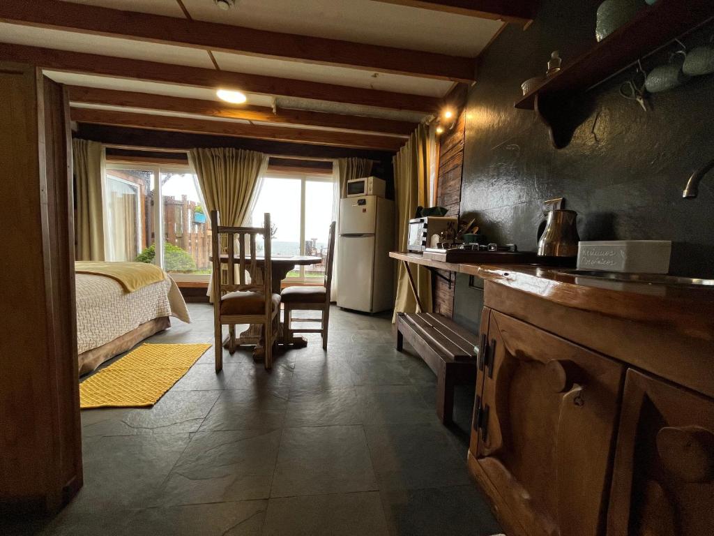 Kuchyň nebo kuchyňský kout v ubytování Cabañas Fischer SpA
