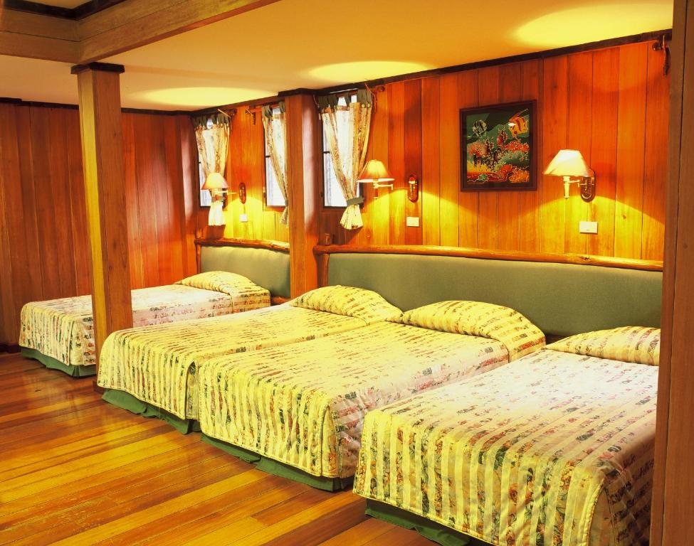 Postel nebo postele na pokoji v ubytování Banpu Koh Chang Resort