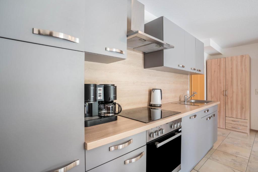 Kuchyň nebo kuchyňský kout v ubytování Ferienwohnung Hohfelsenblick