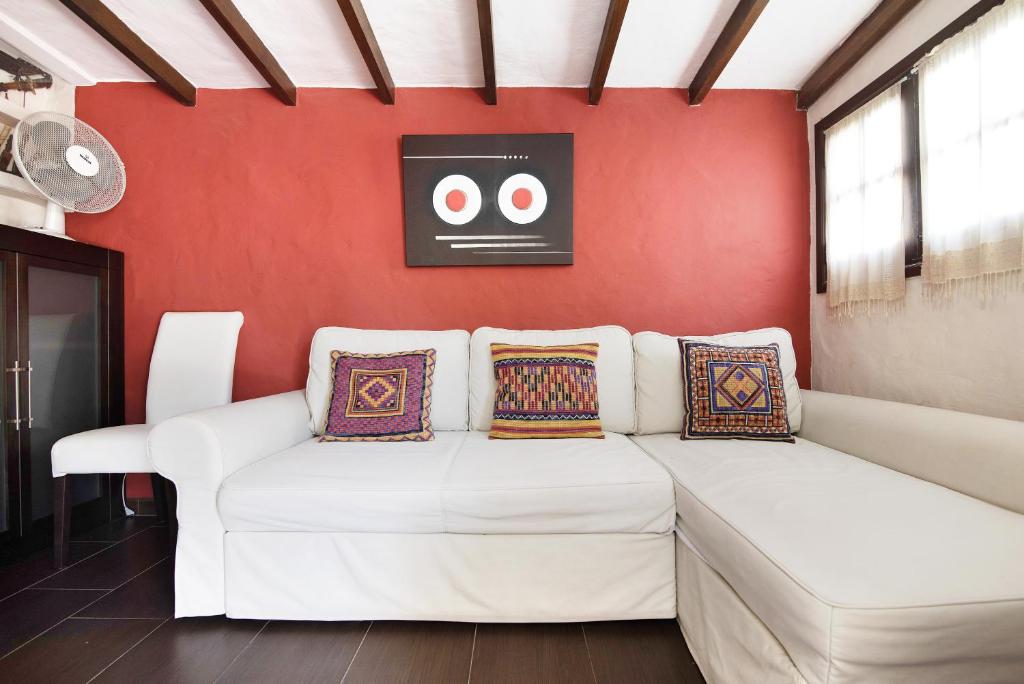 A bed or beds in a room at La Suerte