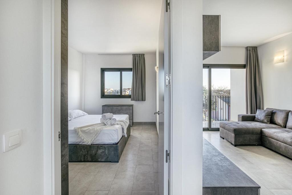 A bed or beds in a room at Giuliano Superior 1 para 4 personas
