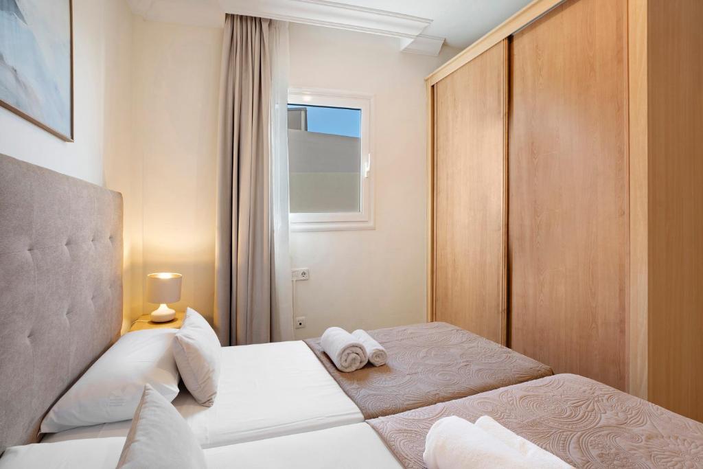 Postel nebo postele na pokoji v ubytování Luxury Villa Taganana