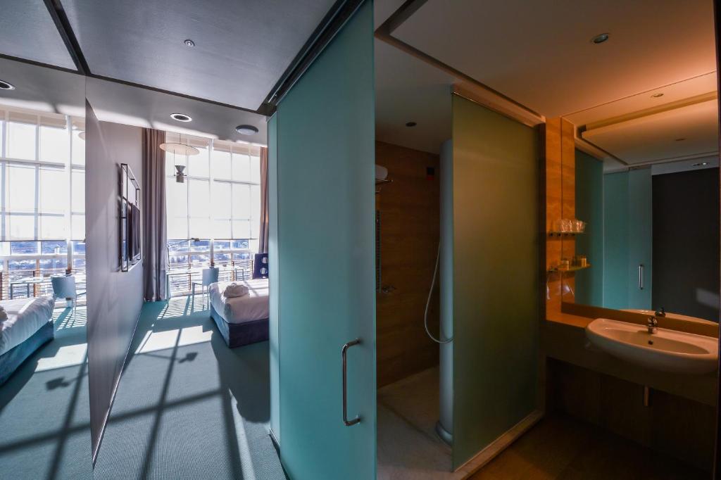 Posezení v ubytování DoubleTree by Hilton Turin Lingotto