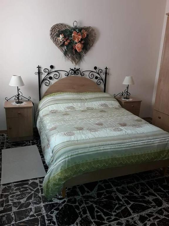 Postel nebo postele na pokoji v ubytování Villa Palma