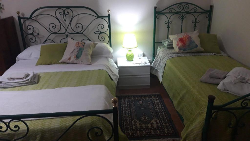 Postel nebo postele na pokoji v ubytování Tavernetta da Bruna