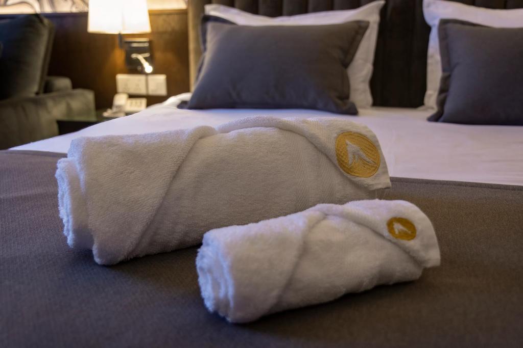 Postel nebo postele na pokoji v ubytování Orienta Hotel Gyumri