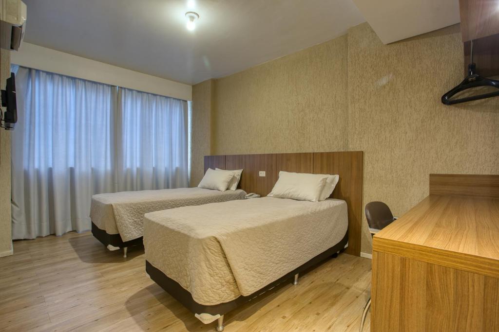 Cama ou camas em um quarto em Roochelle Hotel by Nobile