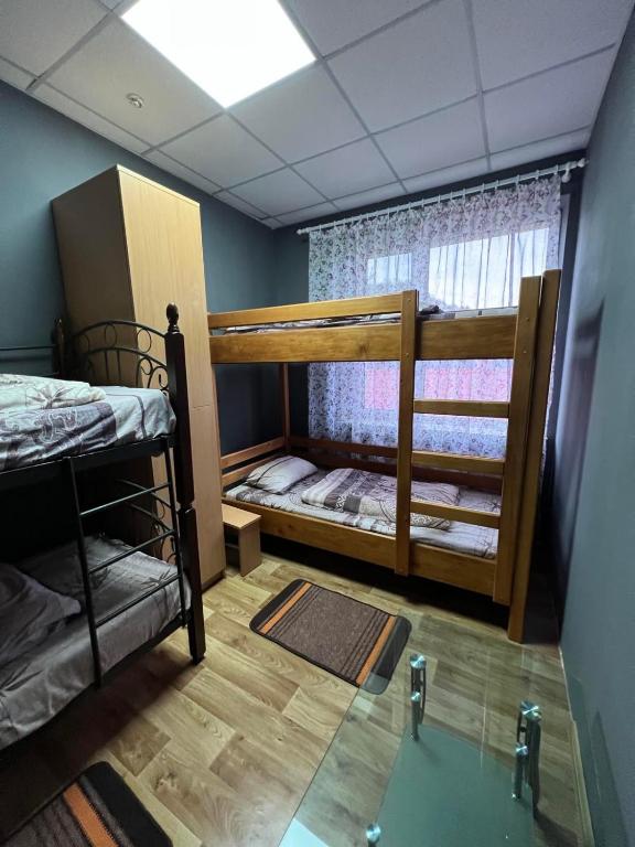 Postel nebo postele na pokoji v ubytování Welcome 24 Mukachevo