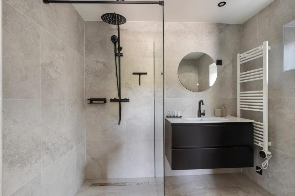 Koupelna v ubytování Huisje Wenum - Apeldoorn met jacuzzi