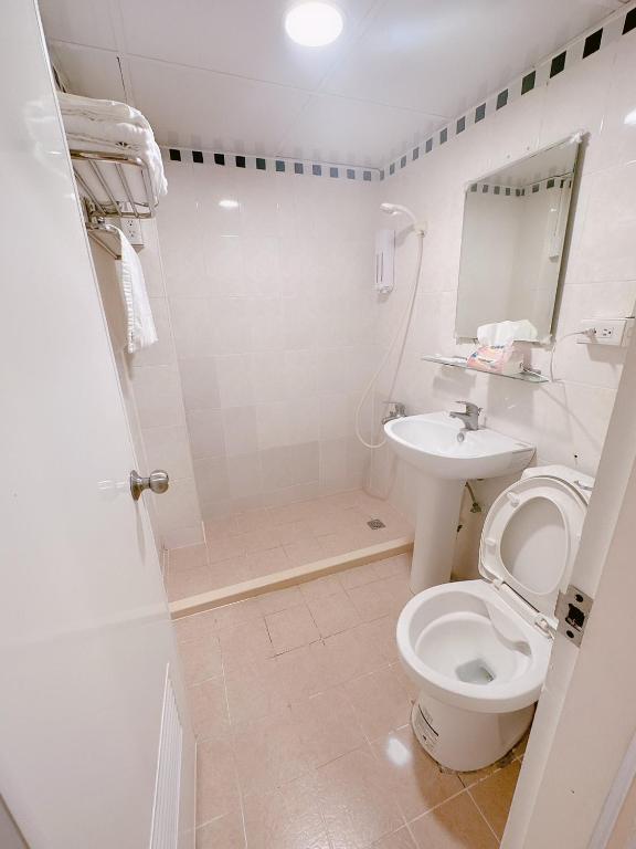 Koupelna v ubytování 新獅城商務旅館New Lion City Hotel